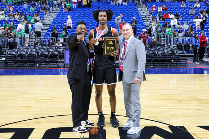 Dillon Battie poses with the Class 5A state championship trophy after leading a Lancaster win over Killeen Ellison.